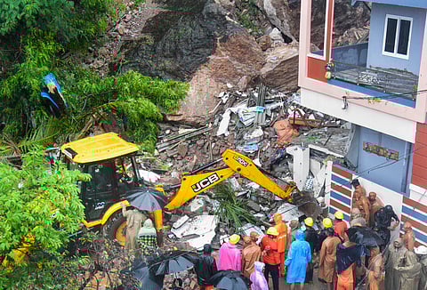 Rescue work underway after a house collapsed due to heavy rainfall, at Moghalrajpuram in Vijayawada, Saturday, Aug. 31, 2024. At least one person was killed in the incident, according to officials.
